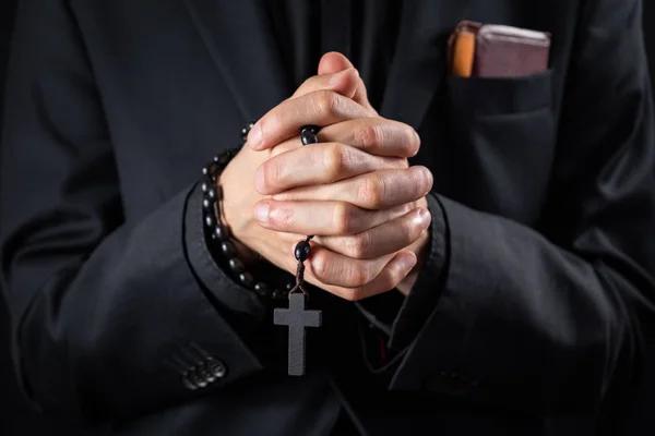 depositphotos_248873902-stock-photo-christian-person-praying-low-key