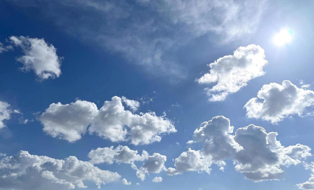 bright-sunny-day-with-blue-sky-with-white-clouds-free-photo