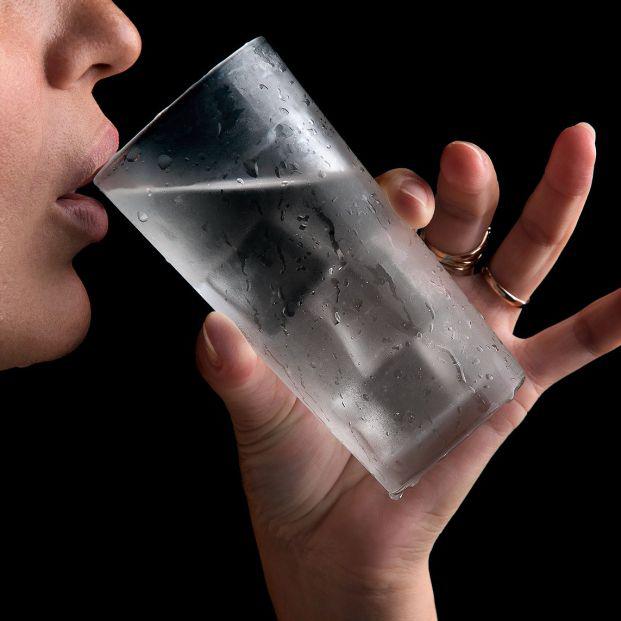 bigstock-the-girl-drinks-from-a-glass-w-346299844_1_621x621