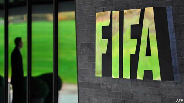 120712013803_a_guard_stands_at_the_entrance_of_the_fifa_hq_in_zurich_512x288_afp