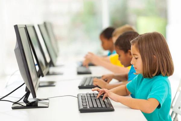 depositphotos_28928531-stock-photo-elementary-school-students-in-computer