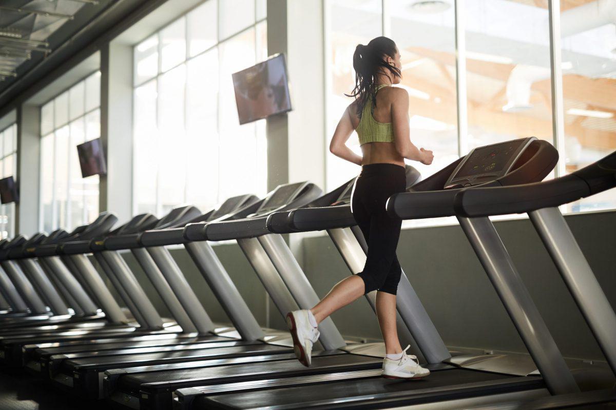 young-woman-running-on-treadmill-2021-09-24-04-03-20-utc-scaled-e1654760656167