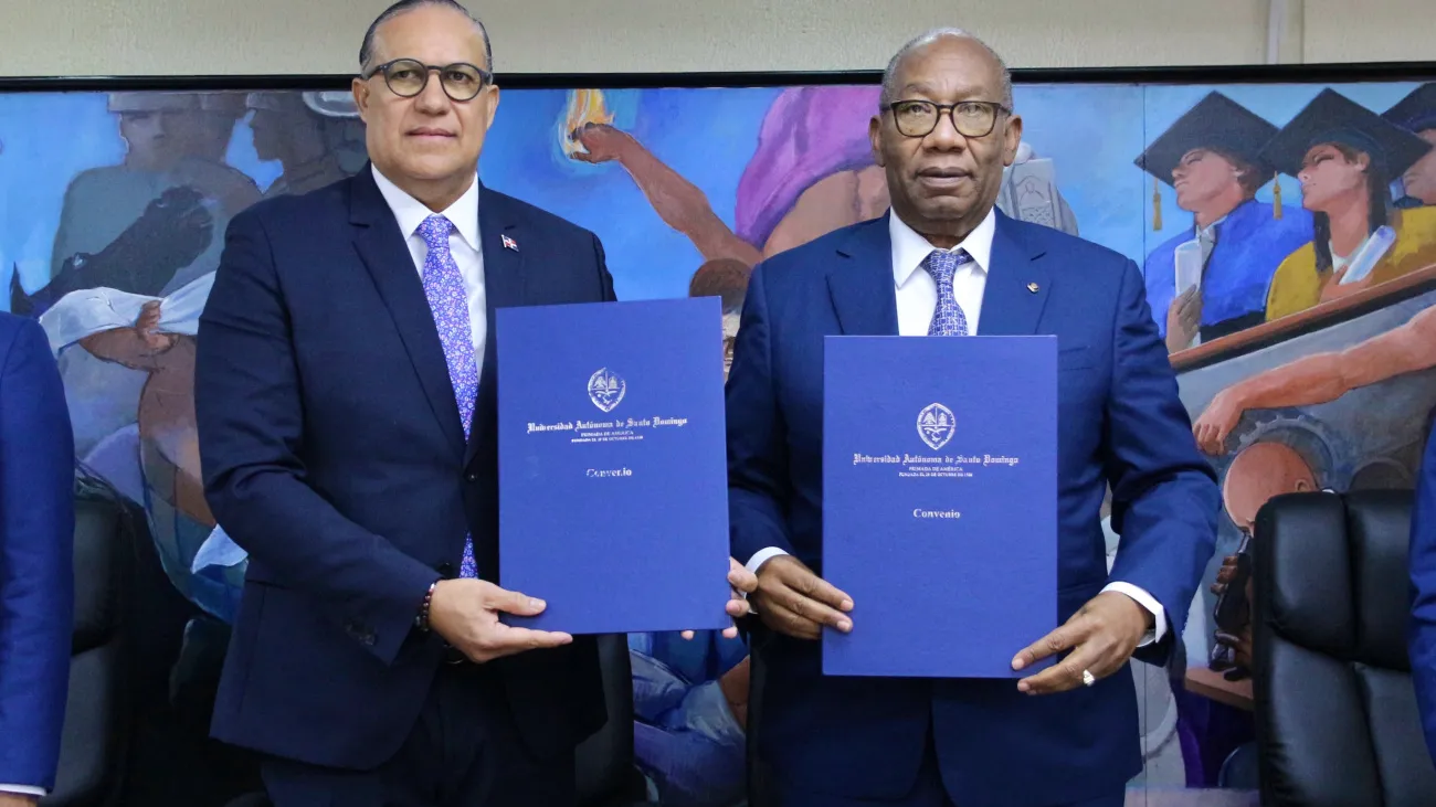 Director ejecutivo del ODAC, Ángel David Taveras Difo y el rector de la UASD, Editrudis Beltrán Crisótomo