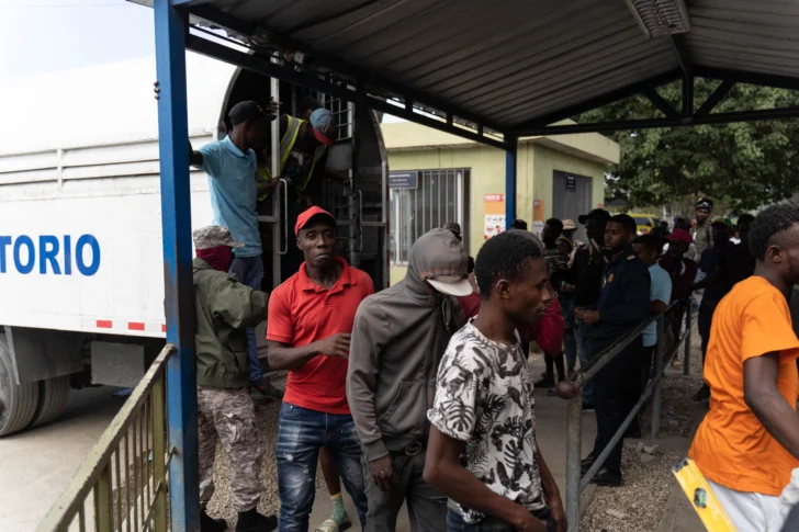 AFP__20221219__AA_19122022_996836__v1__HighRes__HaitiansDeportedFromDominicanRepubli-728x485