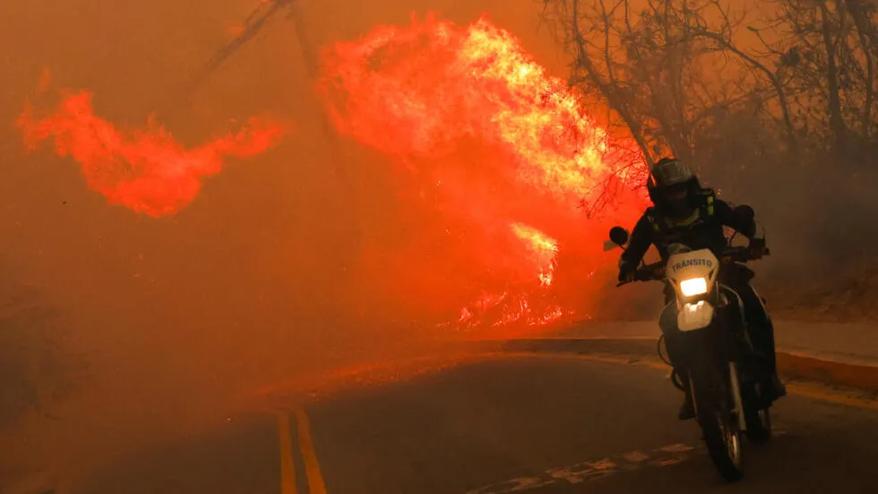 w980-p16x9-2024-09-25T012827Z_370279442_RC2A7AA1TE4W_RTRMADP_3_ECUADOR-WILDFIRES