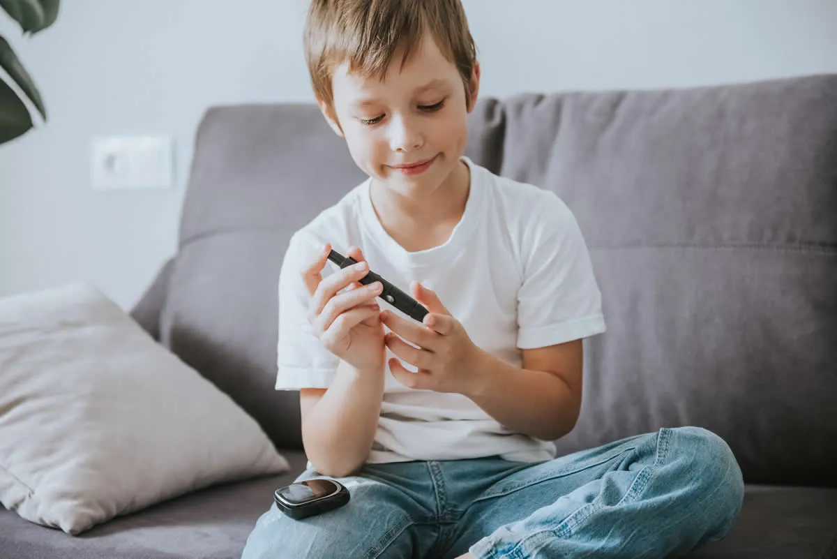 child-boy-measure-glucose-or-blood-suger-level-2022-11-04-16-10-06-utc