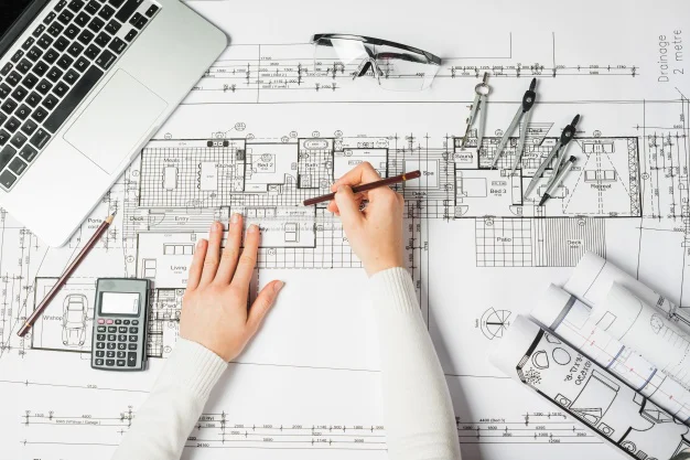 manos-arquitecto-dibujante_23-2147710937