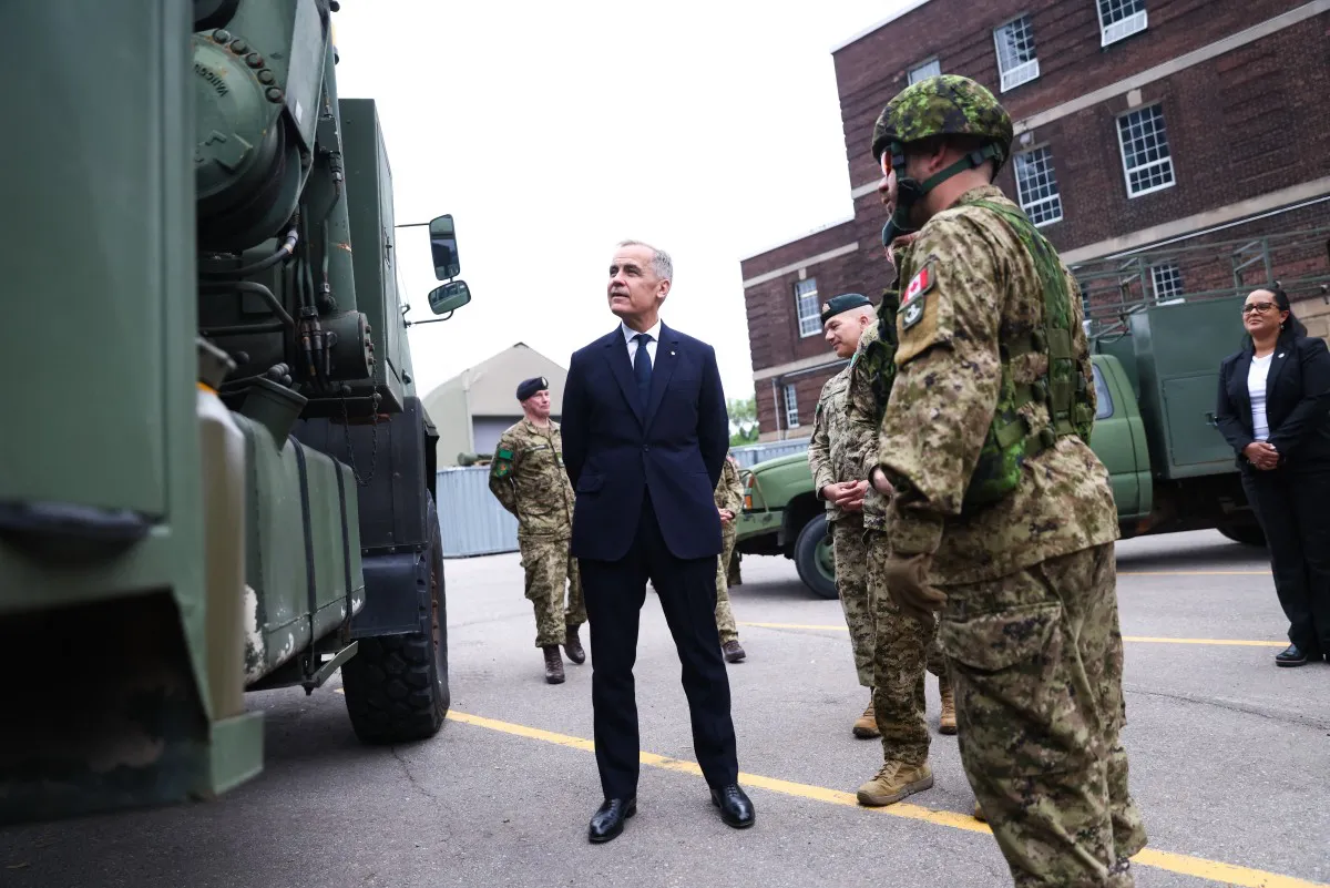 AFP__20250609__2218821100__v1__Preview__CanadianPrimeMinsterCarneyMakesNationalDefen