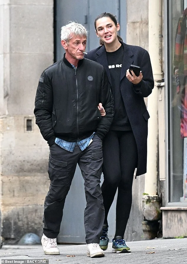 91115225-13984703-Sean_Penn_enjoyed_a_romantic_stroll_through_the_streets_of_Paris-a-45_1729546557871