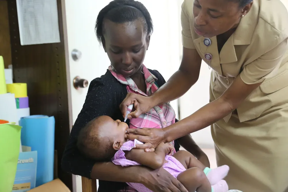 paho-cim-rcc-18-meeting-peru-polio-oral-vaccine-mom-and-baby